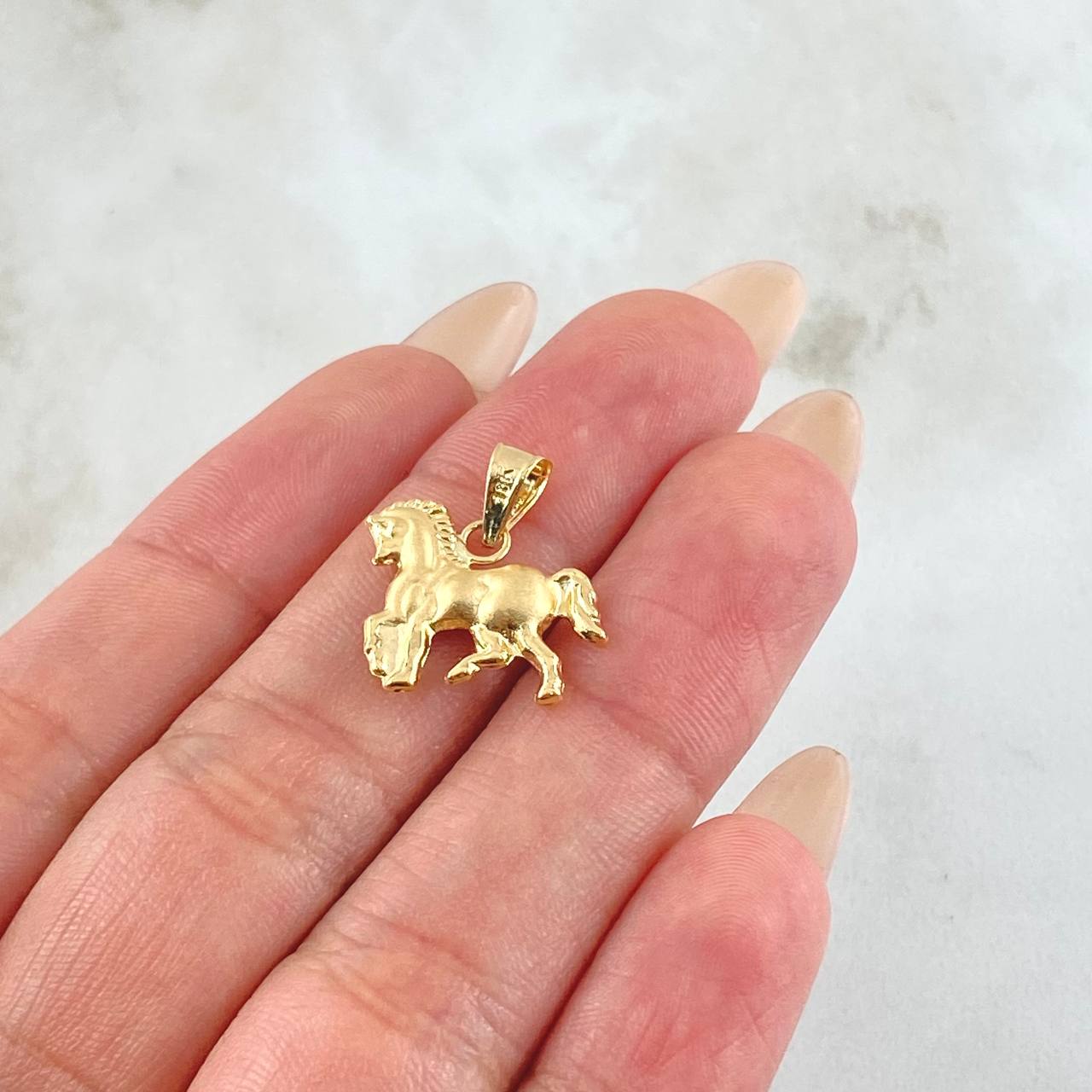 Dije Caballo 0.95gr / 1.8cm / Oro Amarillo 18K ©