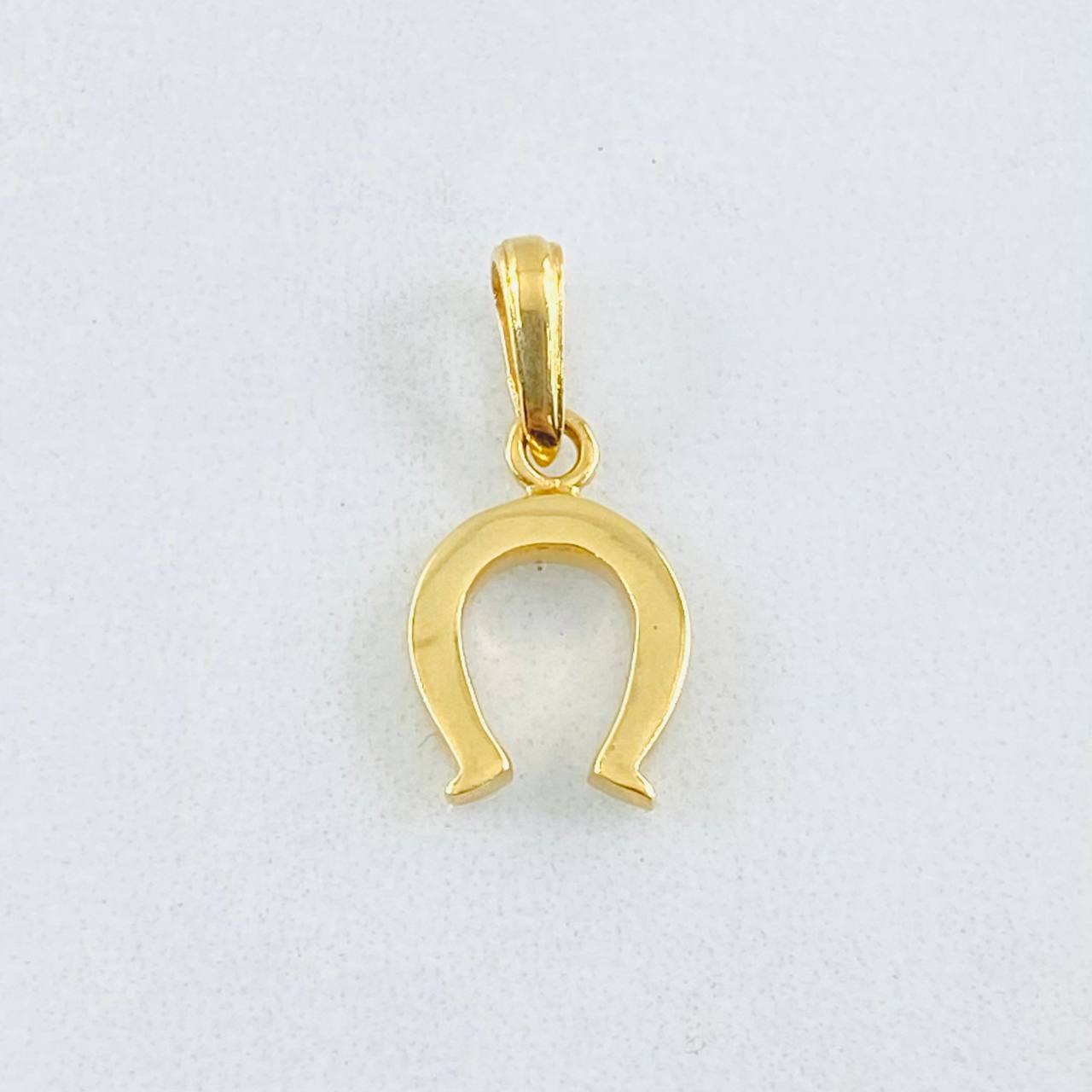 Dije Herradura 0.95gr / 2cm / Oro Amarillo 18K ©