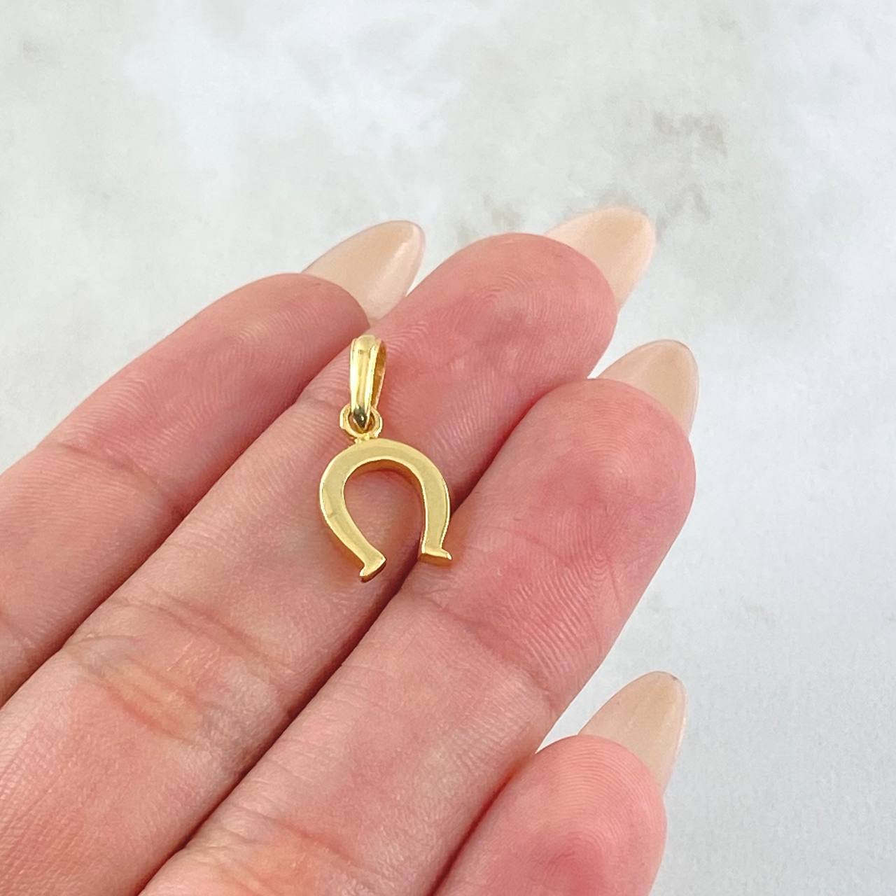 Dije Herradura 0.95gr / 2cm / Oro Amarillo 18K ©