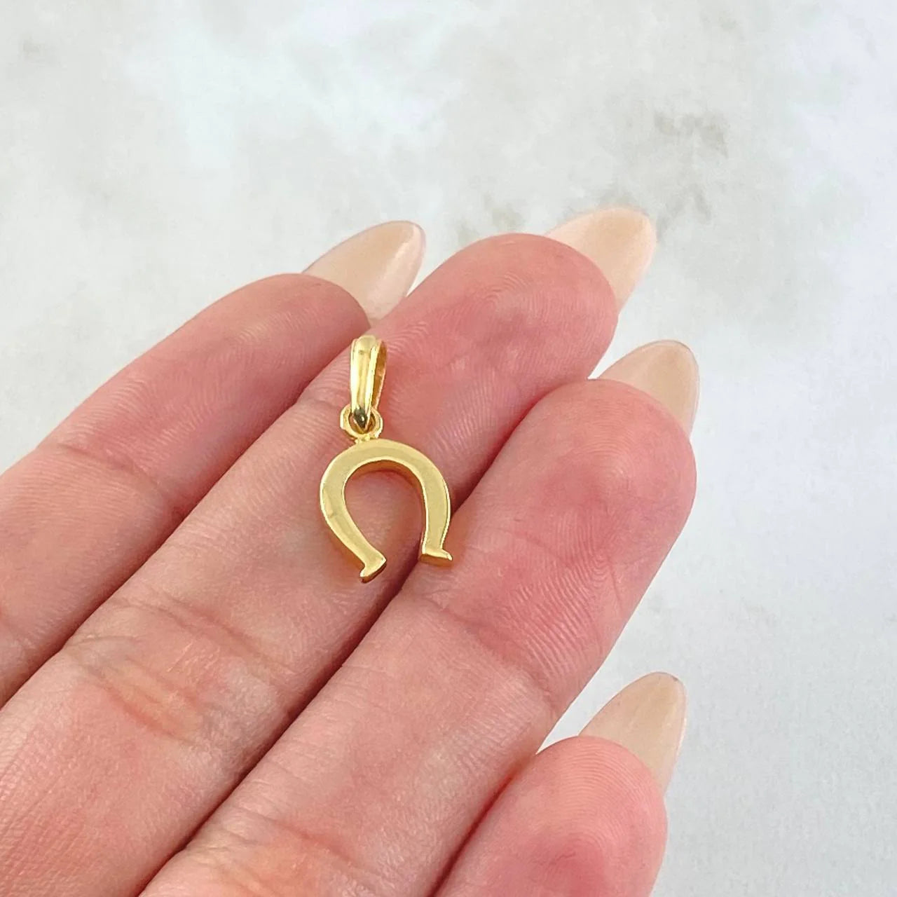 Dije Herradura 1.05 g / 2 cm Oro Amarillo 18K