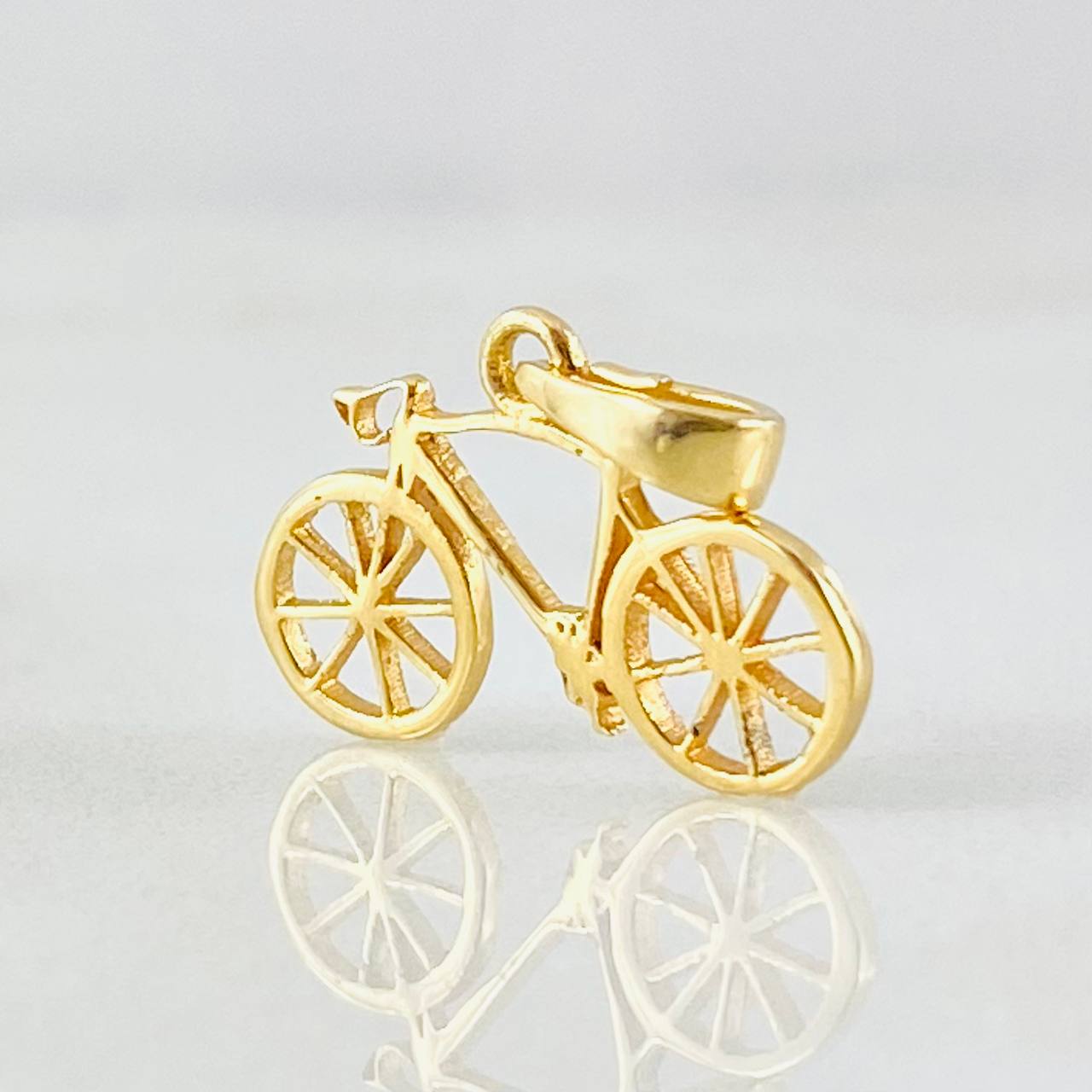 Dije Bicicleta 0.8gr / 1.5cm / Oro Amarillo 18K ©