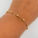 Pulso Tipo Militar Espiga 1.8gr / 18.2cm / 3mm Bolas Diamantadas Oro Amarillo 18K $
