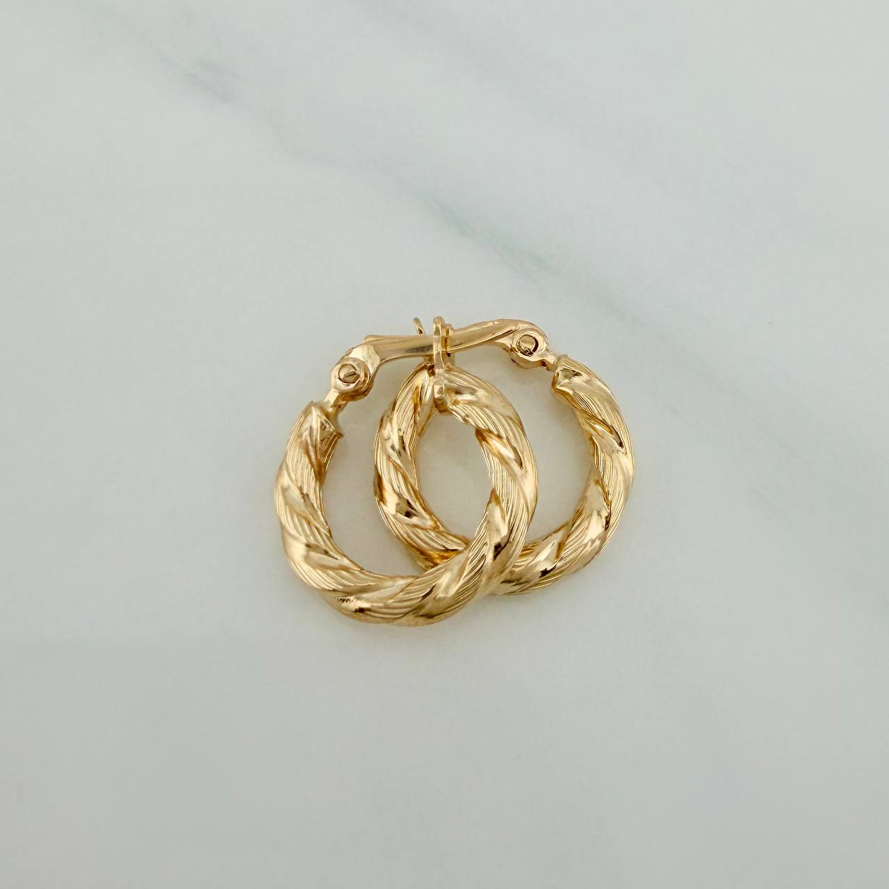 Candongas Sol 1.25gr / 1.7cm / Oro Amarillo 18K $