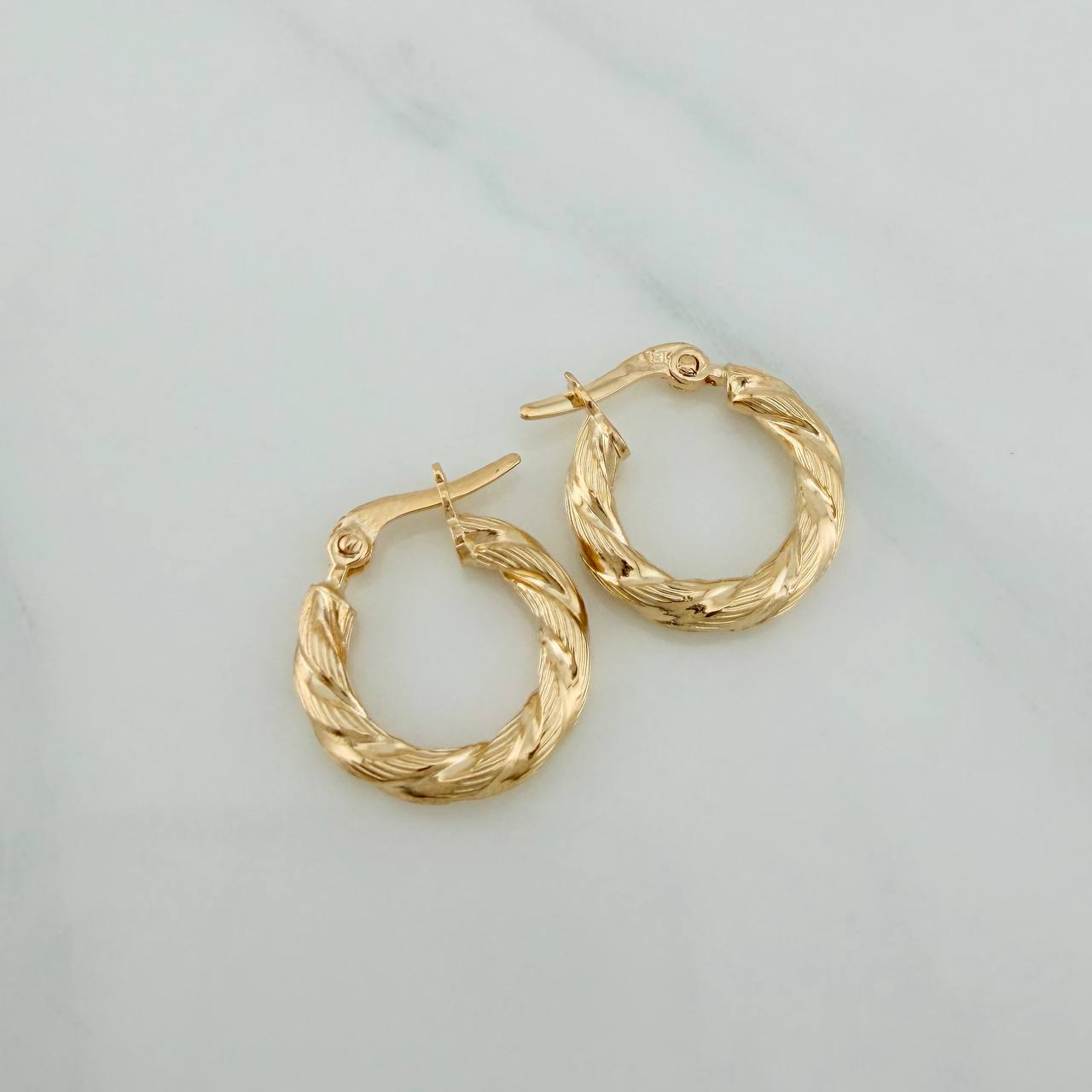 Candongas Sol 1.25gr / 1.7cm / Oro Amarillo 18K $