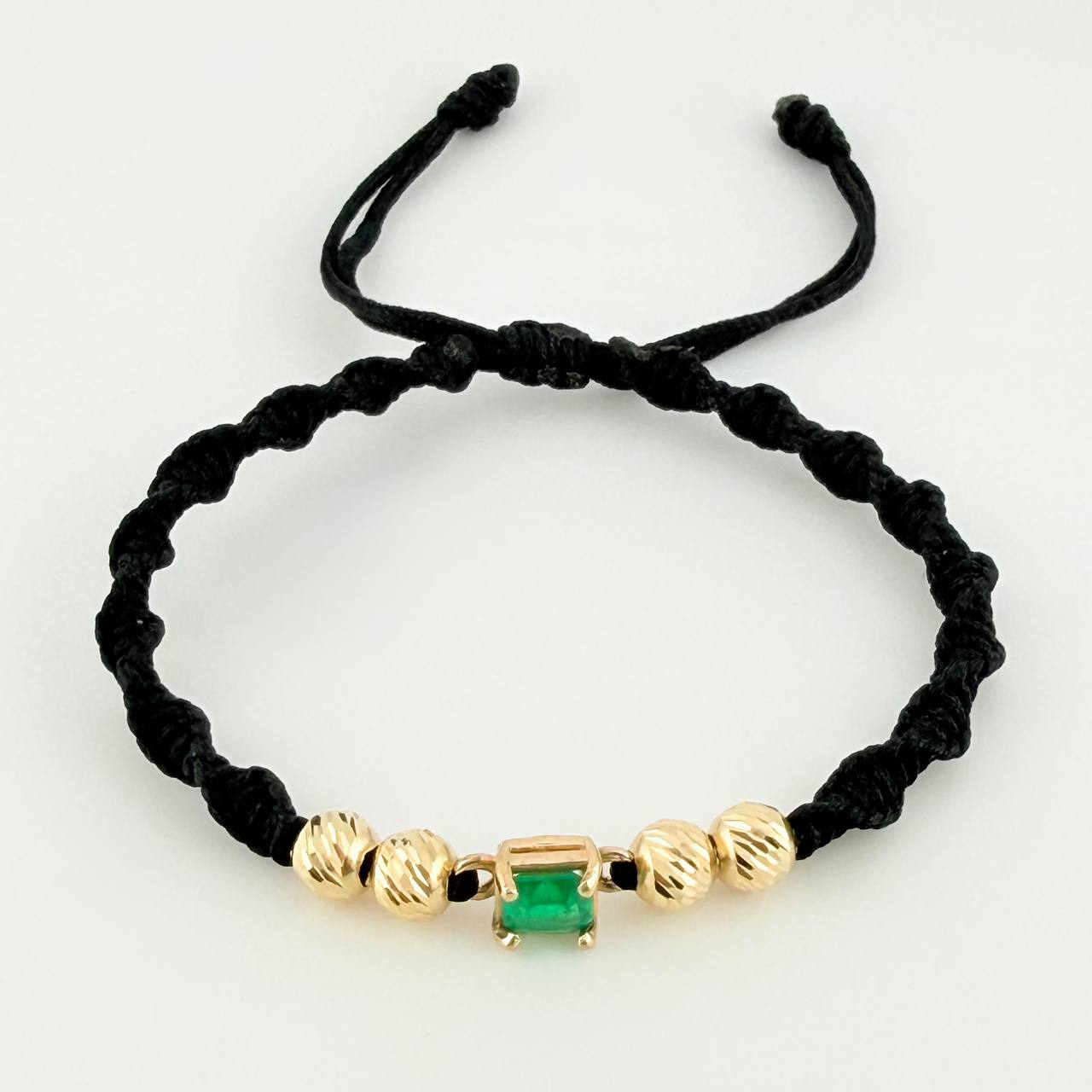 Pulsera Tejida Negra 4 Balines 5mm Cubo Esmeralda 60pts Oro Amarillo 18K