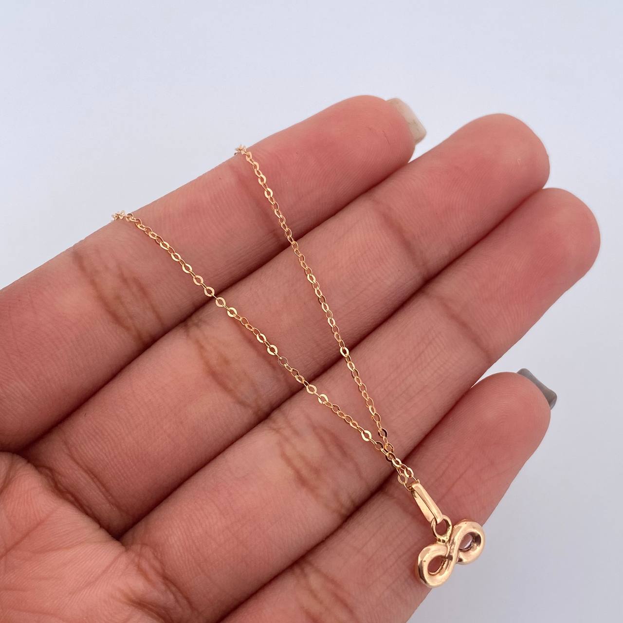 Set Cadena Aro Seguido 0.85gr/45cm/0.8mm + Dije Infinito 0.4gr/1cm Troquelado  Oro 18K (Oferta) &