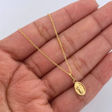 Set Cadena Singapur 1.15gr/50cm/0.8mm + Dije Divino Niño 0.3gr/ 1.4cm Troquelado Oro 18K (Oferta) &