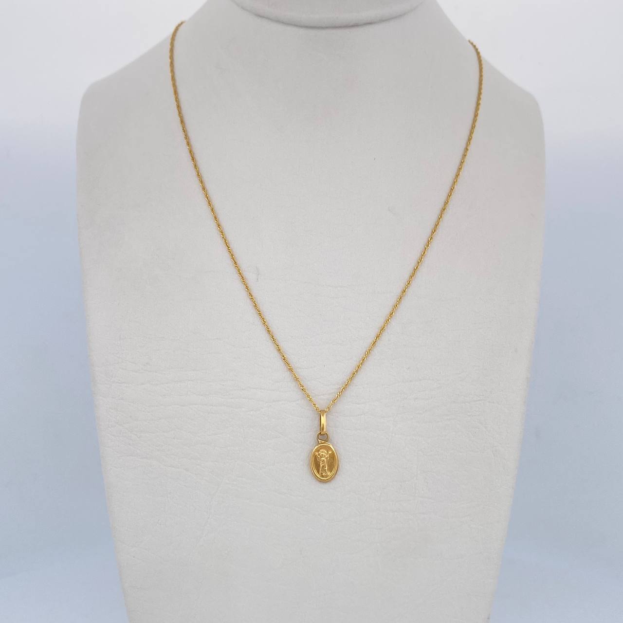 Set Cadena Singapur 1.15gr/50cm/0.8mm + Dije Divino Niño 0.3gr/ 1.4cm Troquelado Oro 18K (Oferta) &