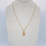 Set Cadena Singapur 1.15gr/50cm/0.8mm + Dije Divino Niño 0.3gr/ 1.4cm Troquelado Oro 18K (Oferta) &