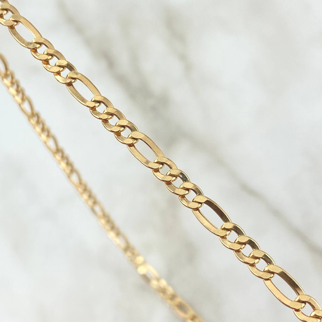 Cadena Figaro 6.7gr / 60cm / 4.5mm Oro Amarillo +1 18K