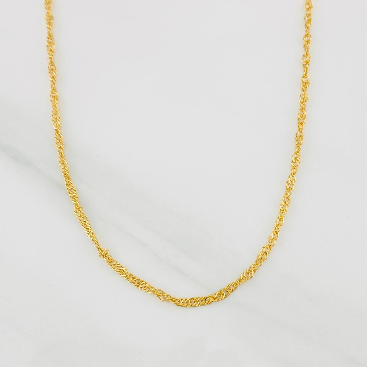 Cadena Singapur 2.7g / 60cm / 1.5mm Oro Amarillo 18K