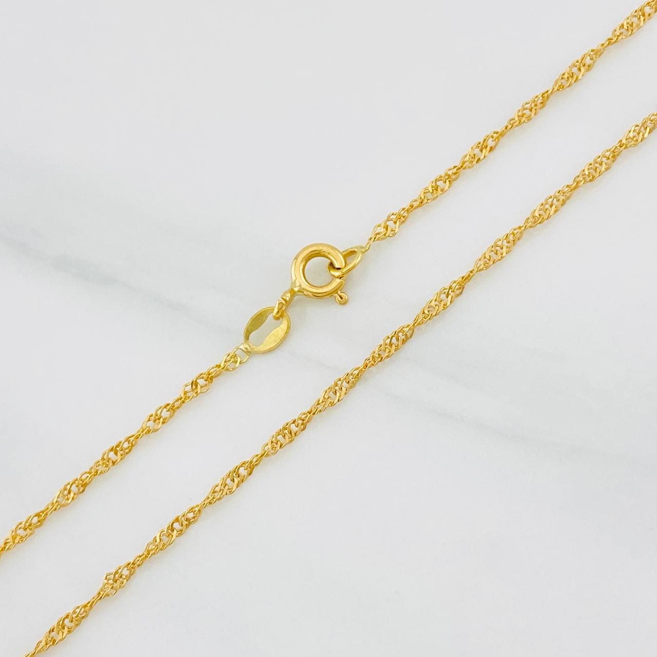 Cadena Singapur 2.7g / 60cm / 1.5mm Oro Amarillo 18K