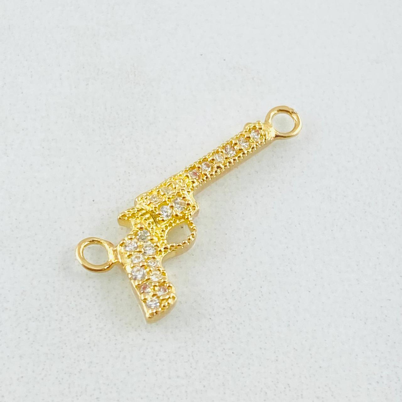 Herraje Arma Revolver Tupido 0.85gr / 2cm / Oro Amarillo 18K