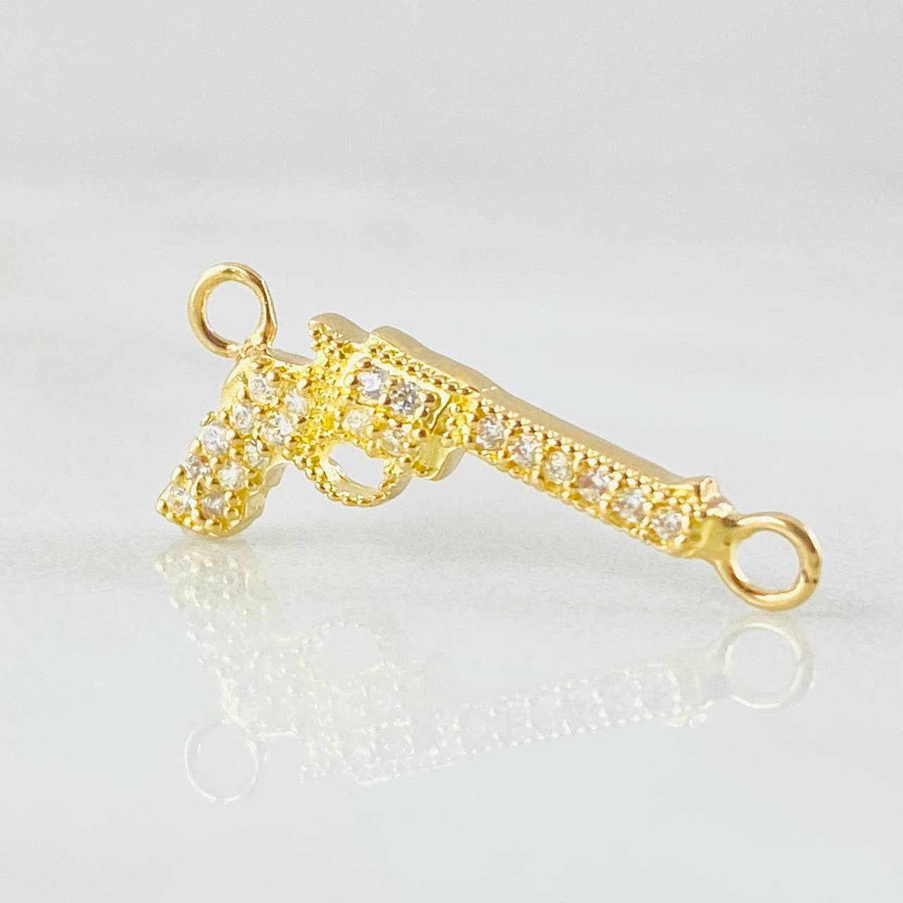 Herraje Arma Revolver Tupido 0.85gr / 2cm / Oro Amarillo 18K