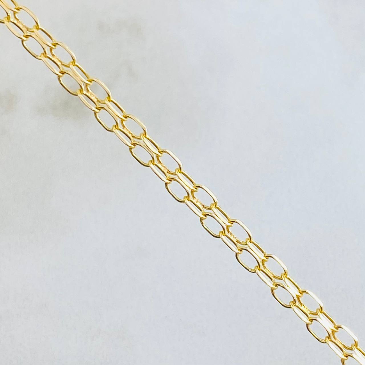 Cadena China 5.4gr / 60cm / Oro Amarillo +1 18K *
