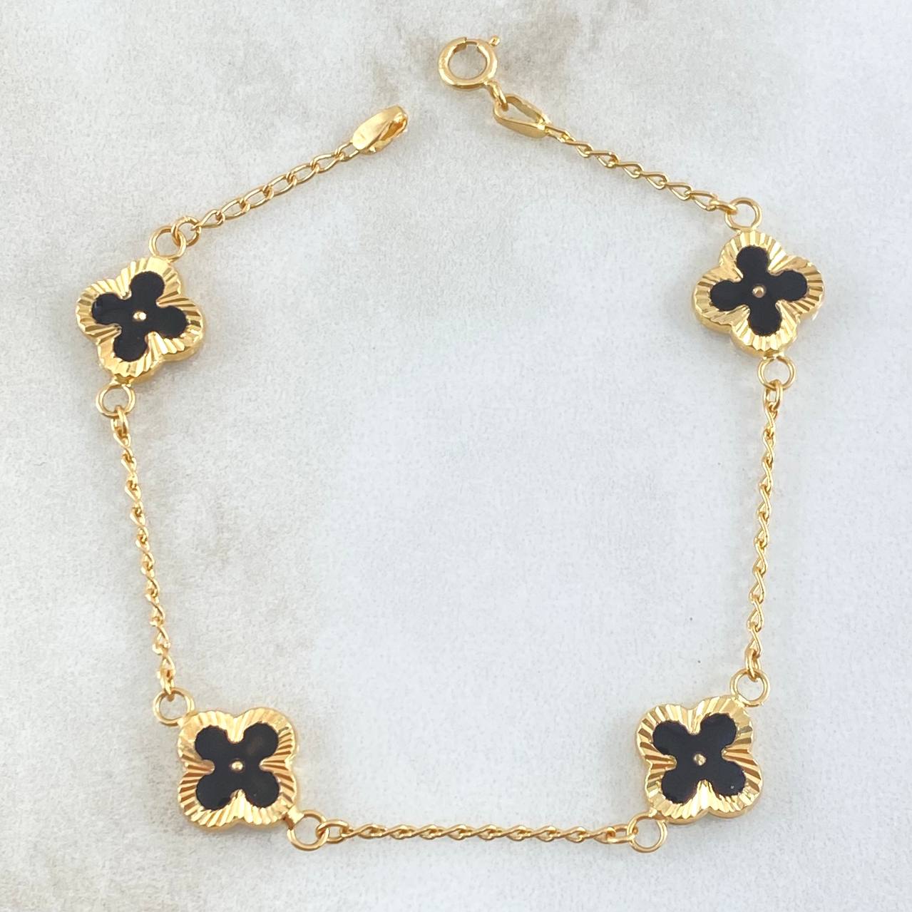 Pulso Espiga Flor Trébol Diamantado 3.25gr / 17.5cm / 1.4mm Resina Negra 4und Oro Amarillo 18K
