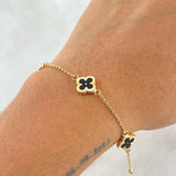 Pulso Espiga Flor Trébol Diamantado 3.25gr / 18cm / 1.4mm Resina Negra 4und Oro Amarillo 18K ©