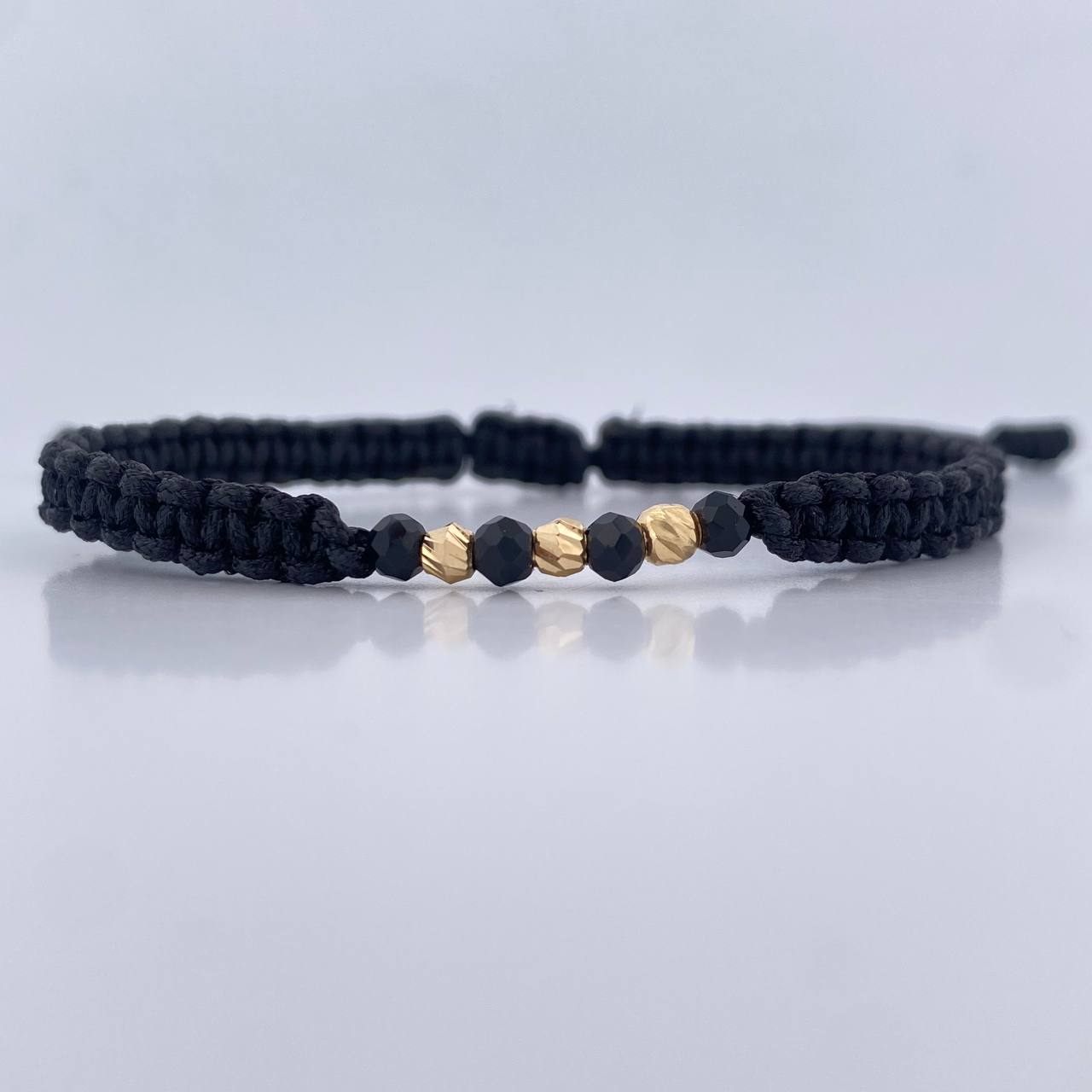 Pulsera Negra Rondela 0.15gr / Oro 18K &