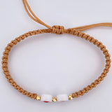 Pulsera Beige Corazones 0.15gr / Oro 18K &