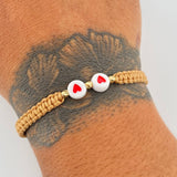 Pulsera Beige Corazones 0.15gr / Oro 18K &