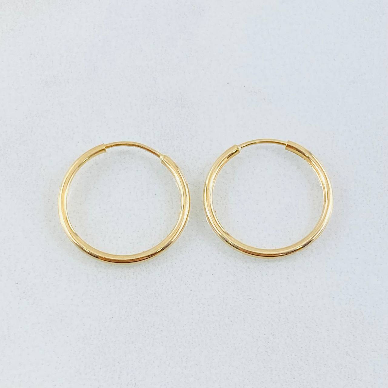 Candongas Aro Liso 0.6gr / 1.4cm / Oro Amarillo 18K *