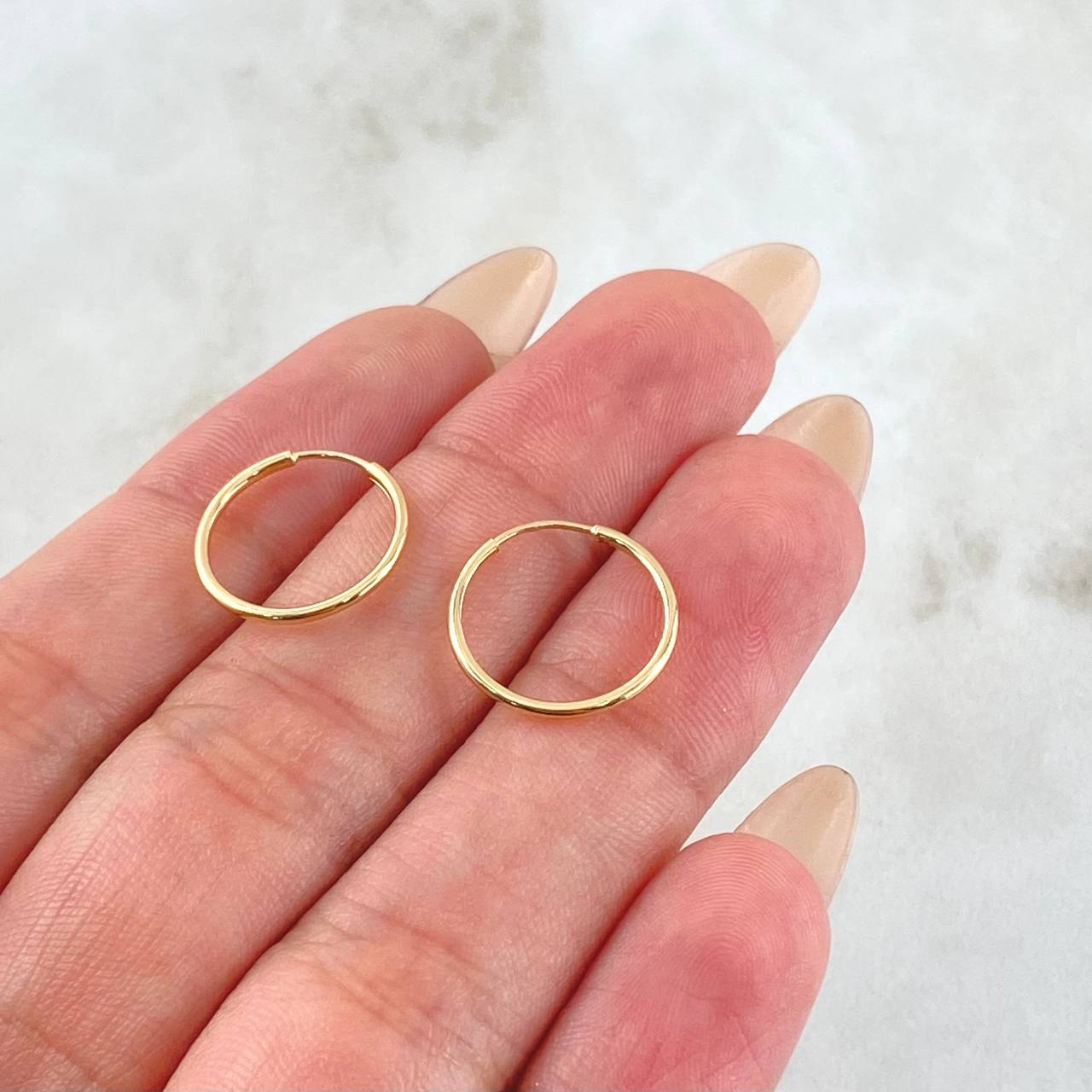 Candongas Aro Liso 0.6gr / 1.4cm / Oro Amarillo 18K ©