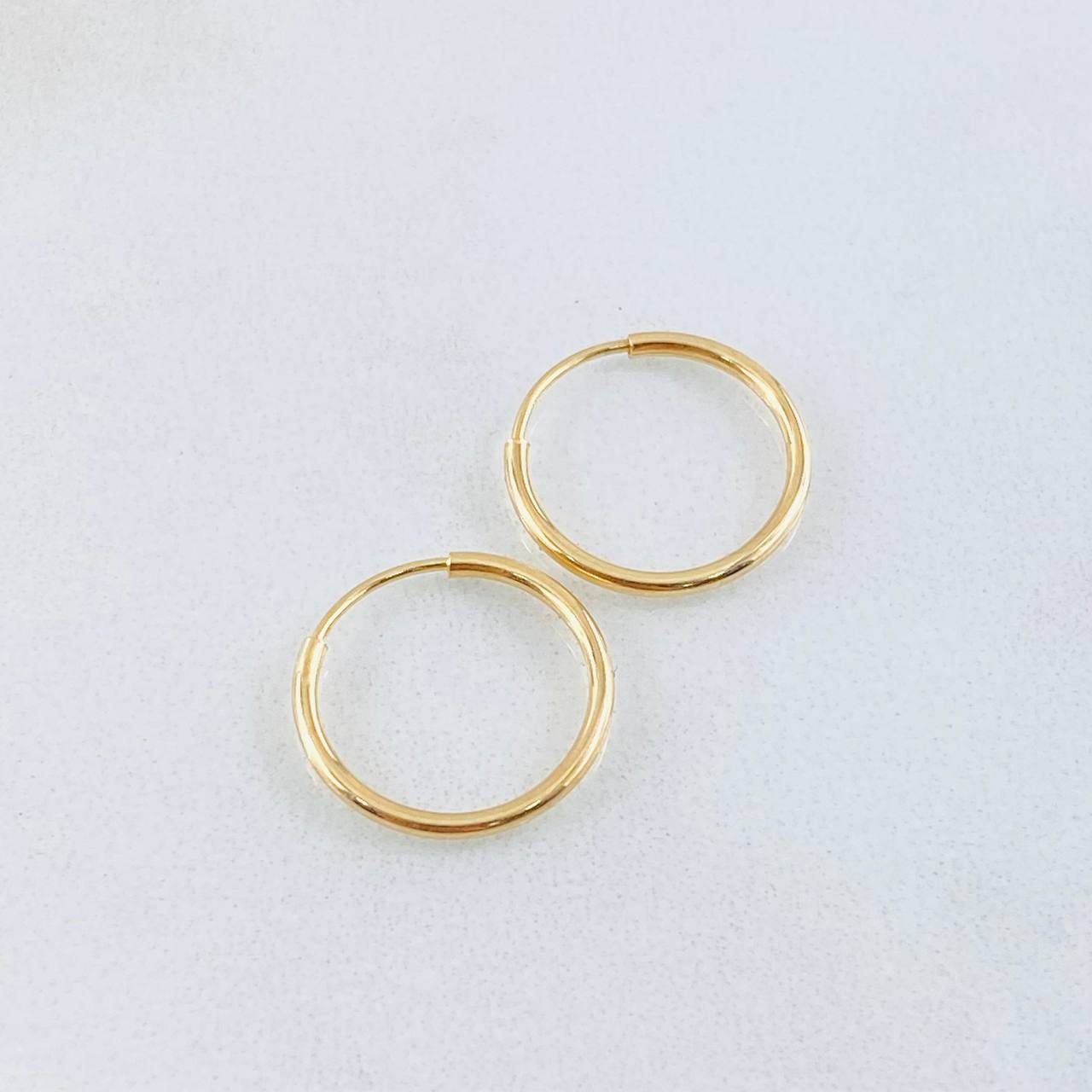 Candongas Aro Liso 0.55gr / 1.2cm / Oro Amarillo 18K *