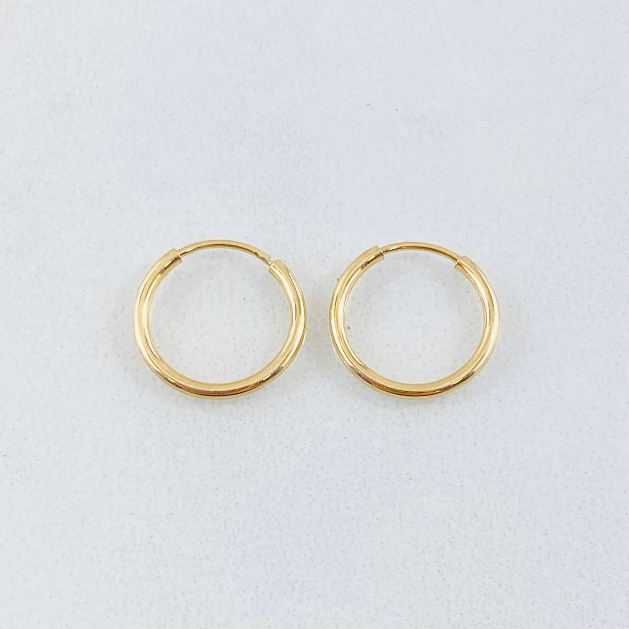 Candongas Aro Liso 0.5gr / 1.2cm / Oro Amarillo 18K ©