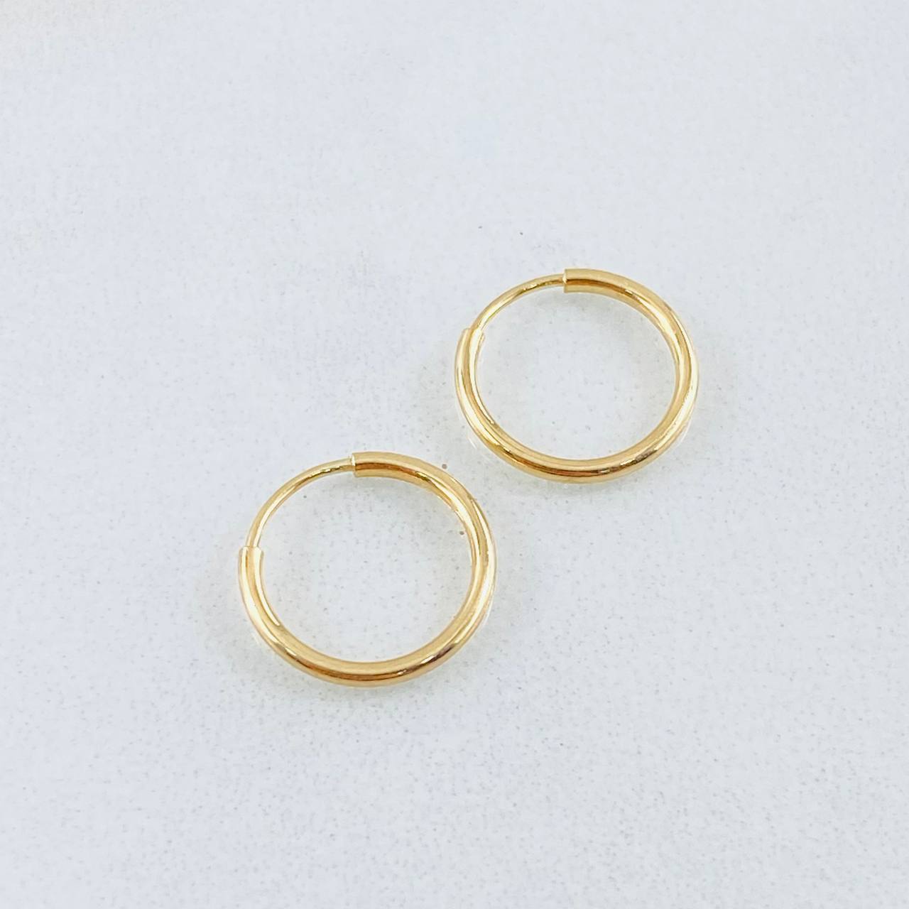 Candongas Aro Liso 0.55gr / 1.2cm / Oro Amarillo 18K ©