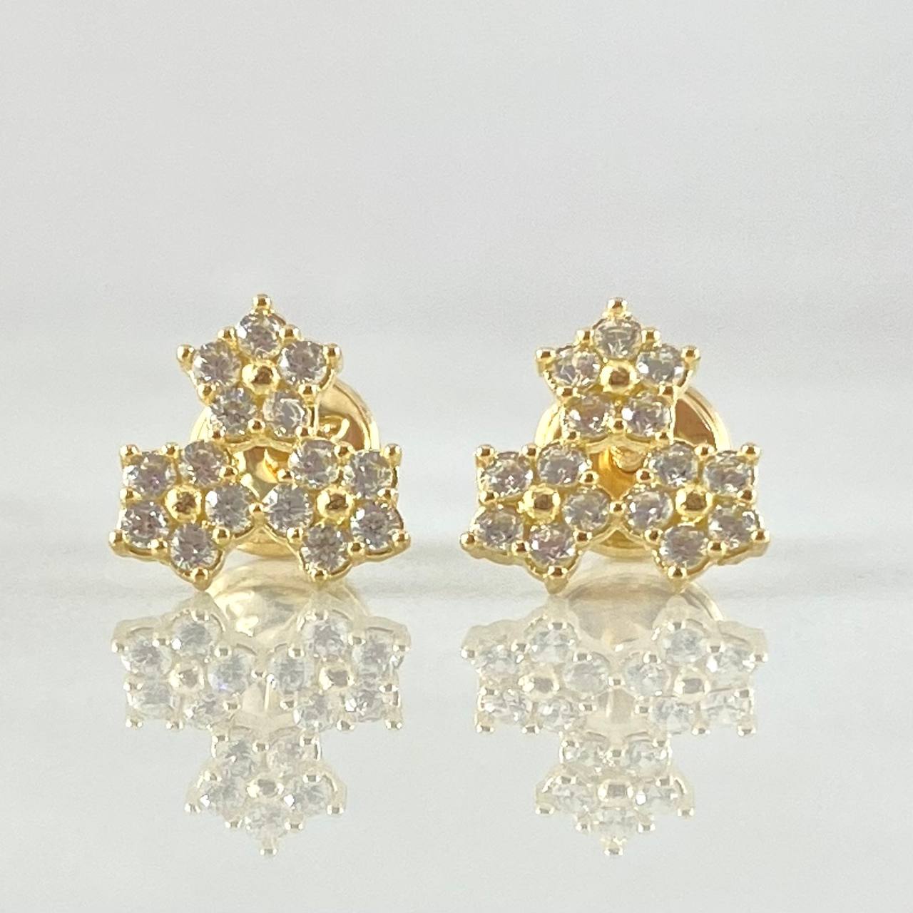 Topos Trio Flores 1.05gr / Oro 18K ©