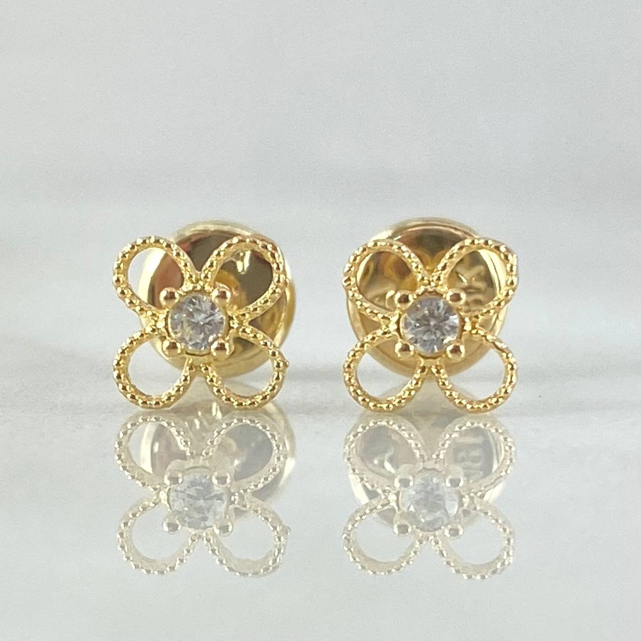 Topos Flor 0.65gr / Oro 18K