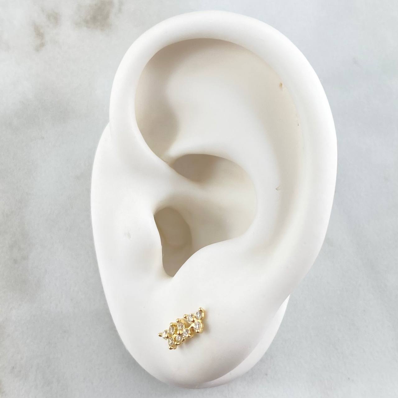 Topos Arco Flores 0.9gr / 1cm / Oro 18K ©