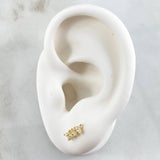 Topos Arco Flores 0.9gr / 1cm / Oro 18K ©