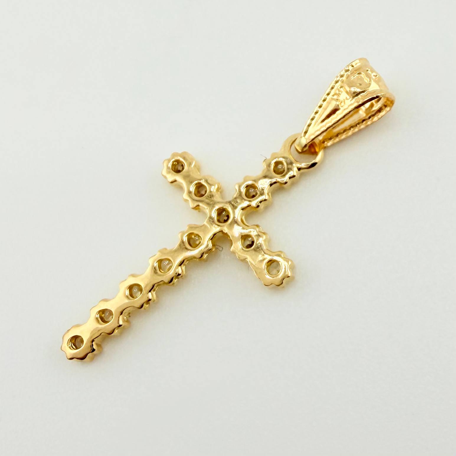 Dije Cruz Tupida 0.95gr / 2.7cm / Oro Amarillo 18K