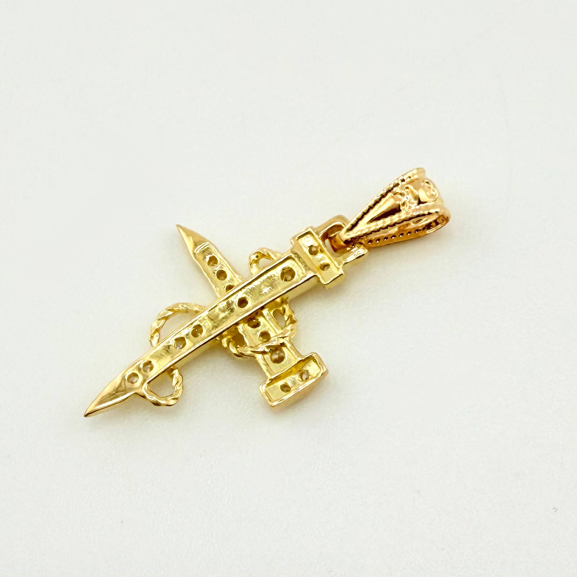 Dije Cruz Clavo 0.95gr / 2.5cm / Oro Amarillo 18K *