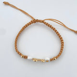 Pulsera Beige Herraje Familia 1.2gr / Oro 18K $