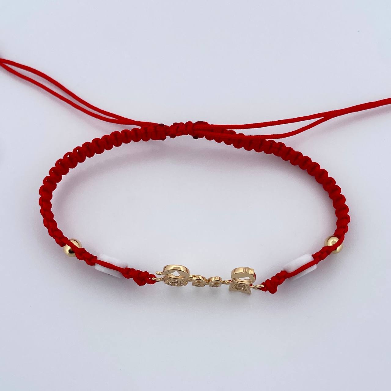 Pulsera Roja Herraje Familia 1.45gr / Oro 18K $