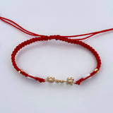 Pulsera Roja Herraje Familia 1.45gr / Oro 18K $