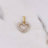 Dije Silueta Corazon 1.35gr / 1.9cm / Doble Faz Circones Negros Blancos Oro Amarillo 18K #