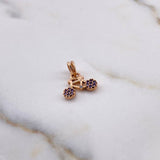 Dije Bicicleta 0.85gr / 1.3cm / Circones Morados Blanco Oro Rosa 18K $