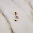 Dije Nota Musical 0.75gr / 1.7cm / Circones Blancos Dos Oros Amarillo Blanco 18K $