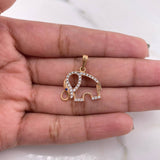 Dije Silueta Elefante 1.6gr / 2cm / Circones Azul Blancos Oro Rosa 18K $