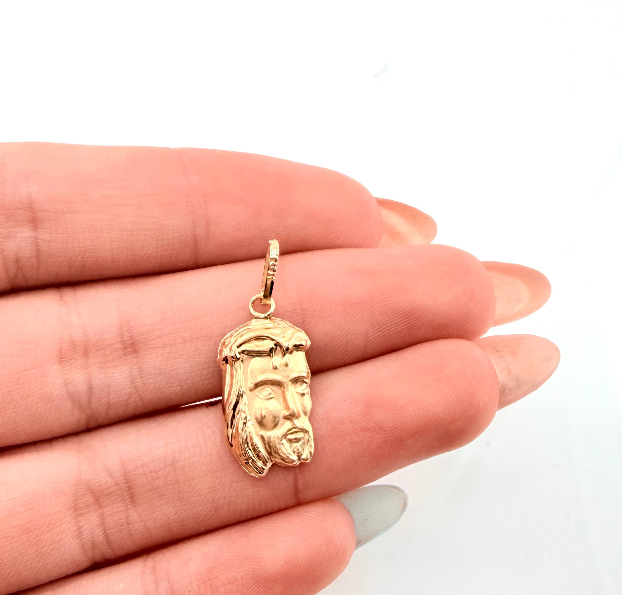 Dije Rostro Cristo 0.85gr / 2.4cm / Oro Amarillo 18K ©