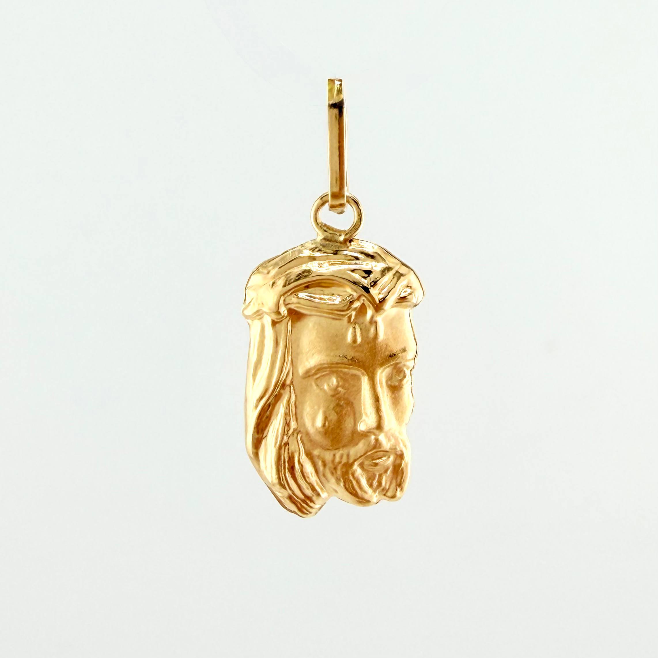 Dije Rostro Cristo 0.85gr / 2.4cm / Oro Amarillo 18K ©