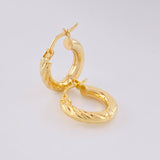 Candongas Adel Mitad Entorchadas 1.65 g / 1.7 cm Oro Amarillo 18K