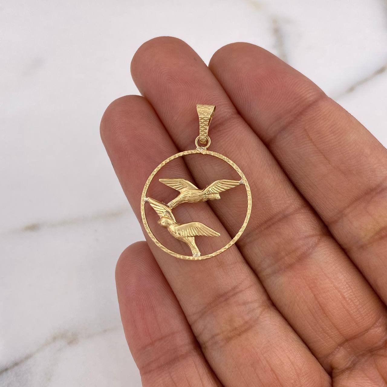 Dije Aro Palomas 0.95gr / 2cm /   Oro Amarillo 18K $