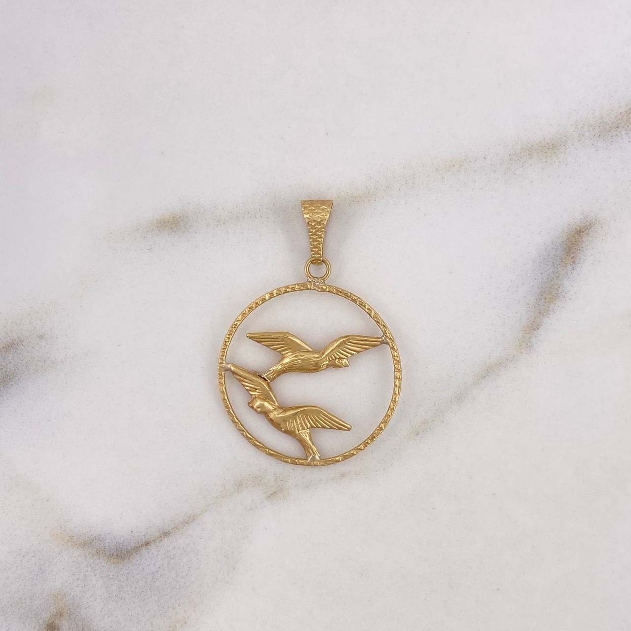 Dije Aro Palomas 0.95gr / 2cm /   Oro Amarillo 18K $