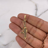 Dije Arma Fusil 2.45gr / 4.4cm / Circones Negros Oro Amarillo 18K $