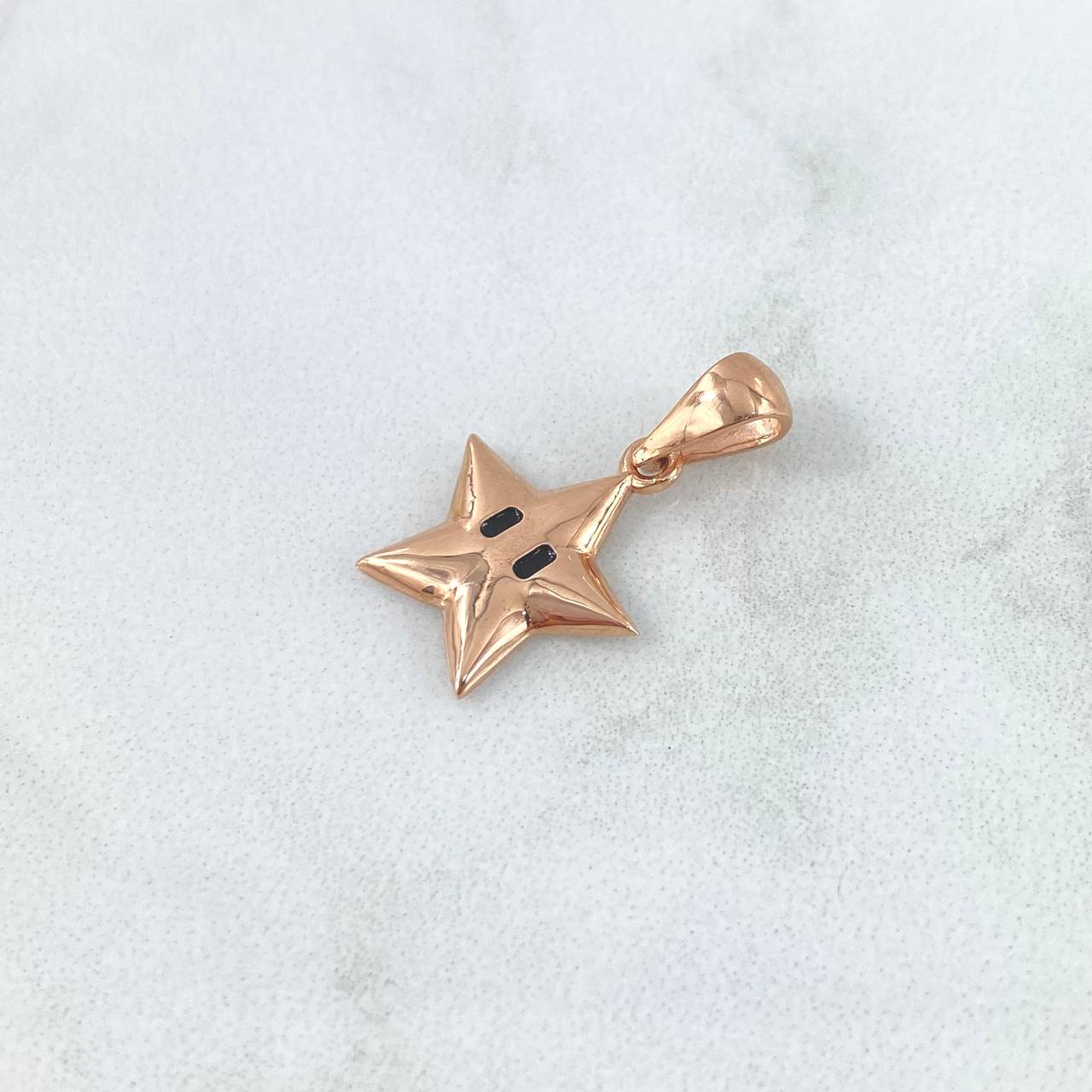 Dije Estrella Animada 1.15gr / 2.2cm / Oro Rosa 18K *