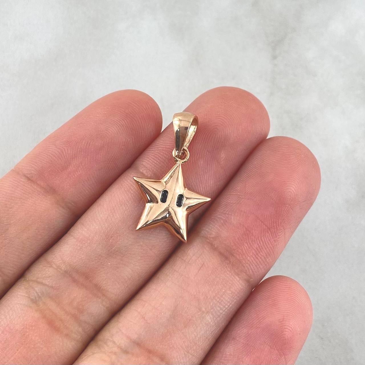 Dije Estrella Animada 1.15gr / 2.2cm / Oro Rosa 18K *